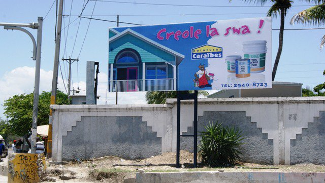 Peintures Caraïbes street billboard sign