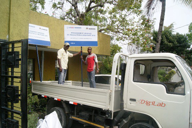 USAID Winner signs by DigiLab Haiti